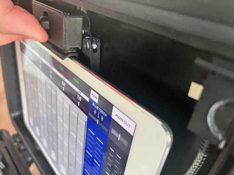 Inserting a tablet into the holder of the Flow 8 Case from BSS