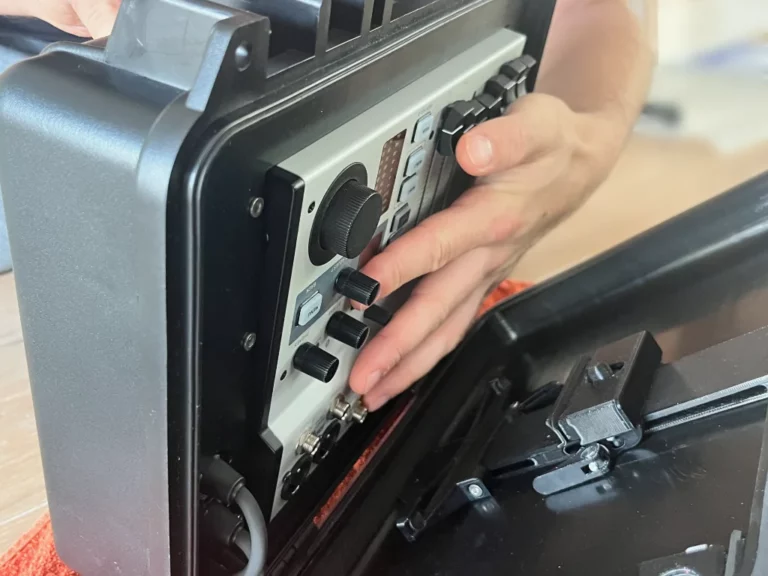 The Flow 8 is removed from the case by standing it up and tilting it.